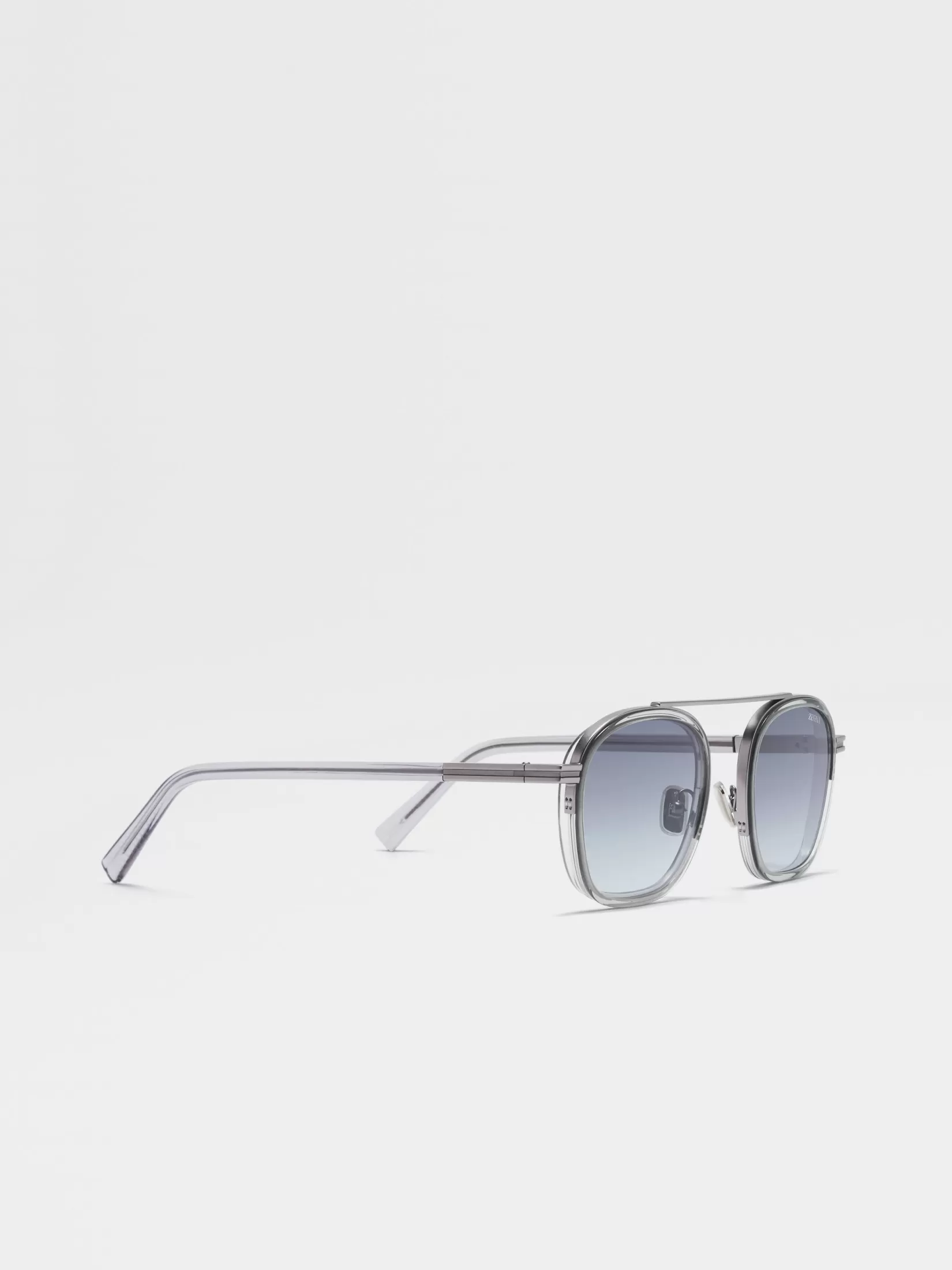 New Occhiali da Sole Orizzonte I in Acetato e Metallo Grigio Chiaro Trasparente Essentials Resort | Piccoli Doni